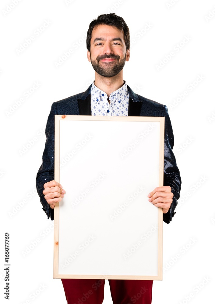 Man with jacket holding an empty placard Man with jacket holding an empty placard