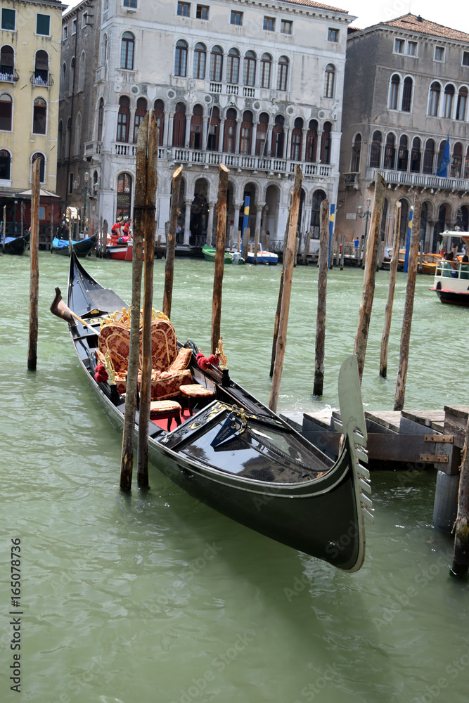 Gondola docked on the Grand Canal in Venice, Italy