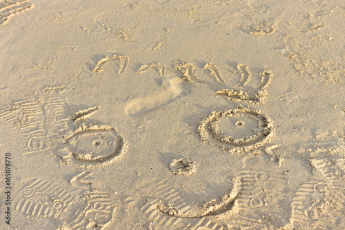 Children play sand on the suchada Rayong beach  rayong thailand photo