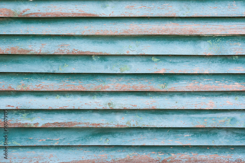 Old wooden blue fence texture as background