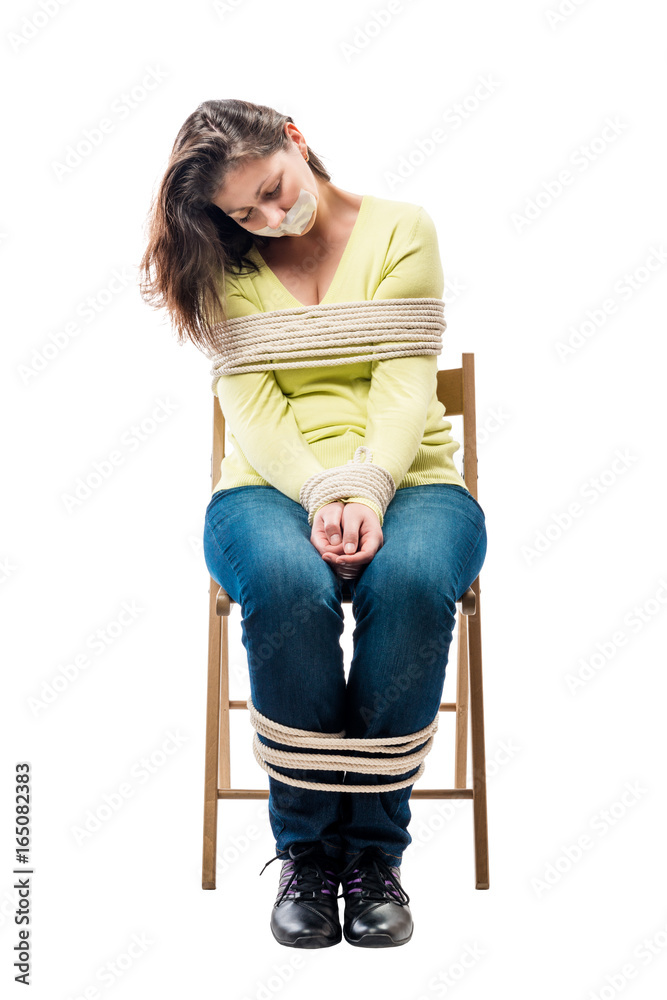 Tired sleeping on a stool hostage bound by ropes on a white background  Stock Photo | Adobe Stock