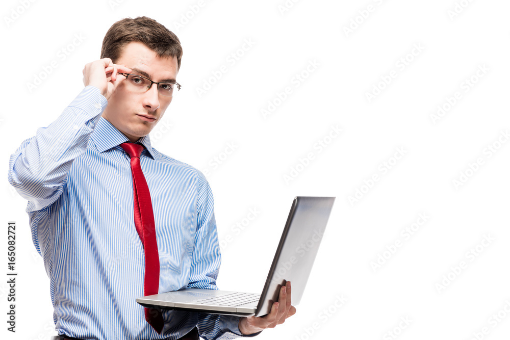Successful accountant with glasses with a laptop on a white background Successful accountant with glasses with a laptop on a white background