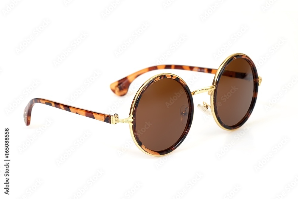 Fototapeta premium Fashionable sunglasses on a white background