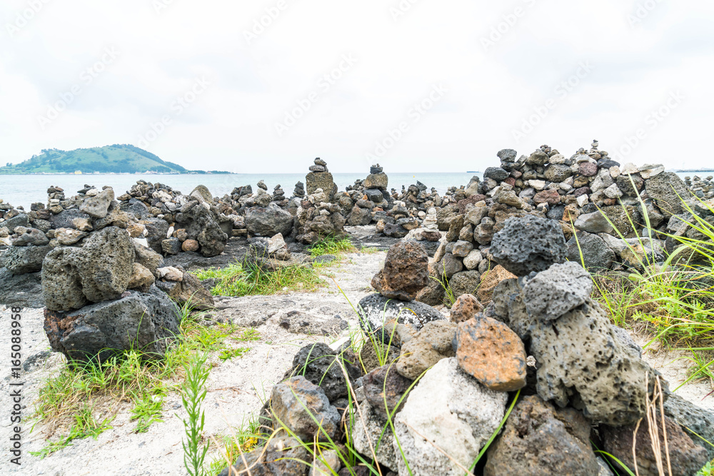 stone towers on basaltic rocks at Hyeopjae Beach,Jeju Island stone towers on basaltic rocks at Hyeopjae Beach,Jeju Island