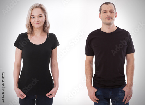 Shirt design and people concept - close up of young man and woman in blank black tshirt front and rear isolated. Mock up template for design print