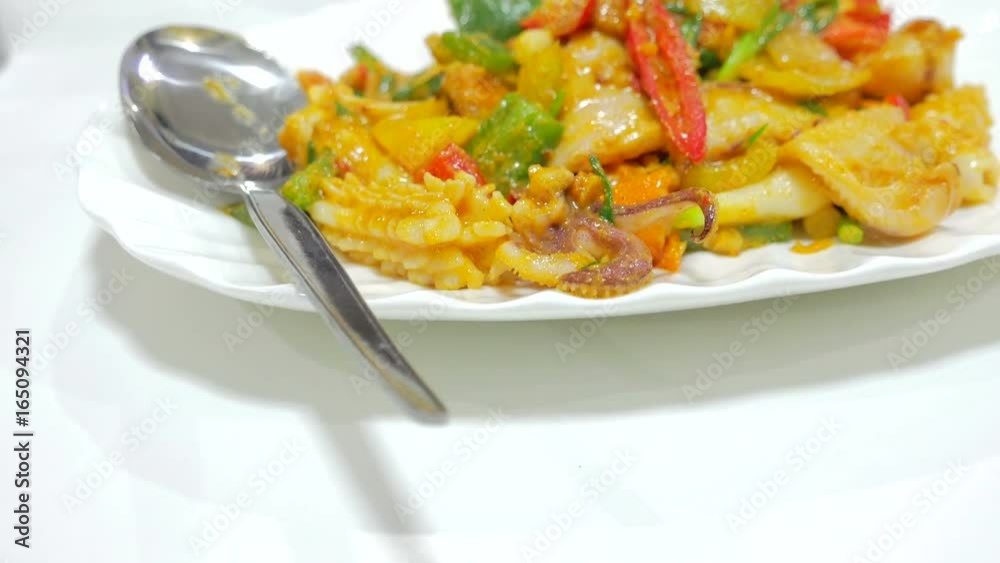 stir fried squid with curry powder and egg, Thai Traditional Cuisine. 