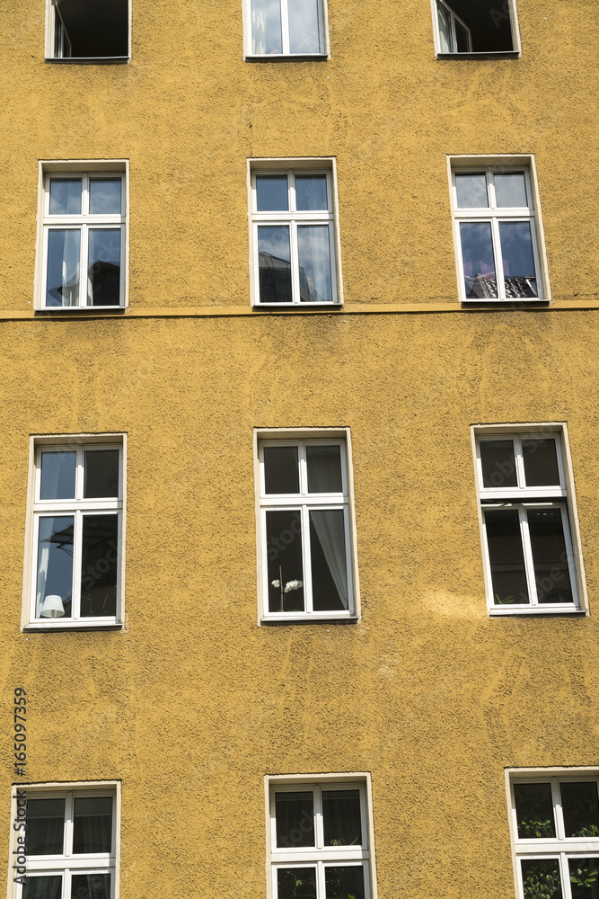 simple yellow house facade in Berlin Kreuzberg simple yellow house facade in Berlin Kreuzberg