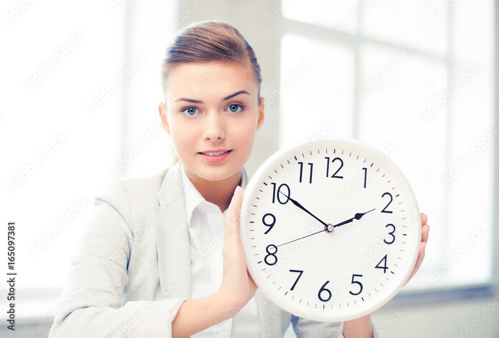 attractive businesswoman showing white clock attractive businesswoman showing white clock