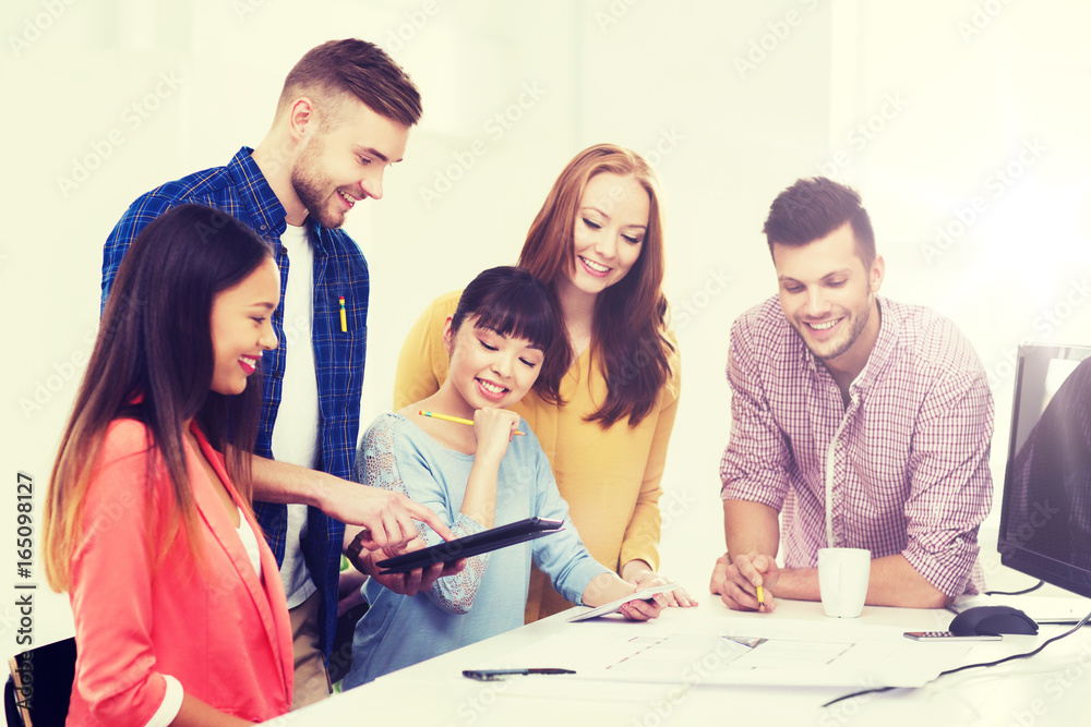 happy creative team or students working at office happy creative team or students working at office