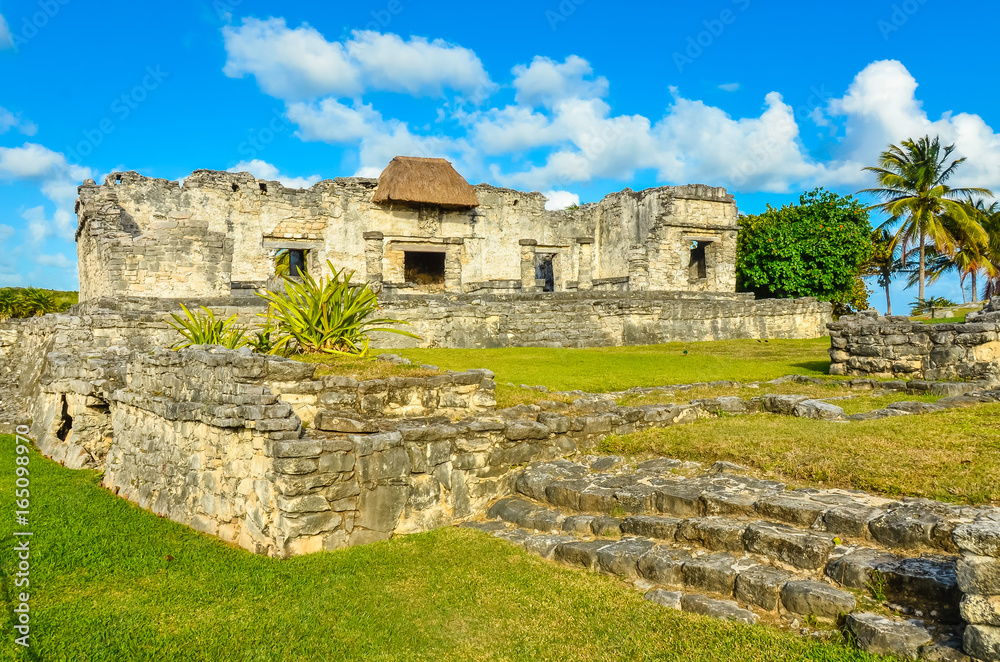Mayan ruins of Tulum at tropical coast. Temple in beautiful landscape. Mayan ruins of Tulum, Quintana Roo, Mexico.