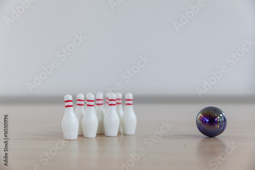 Finger bowling with children's toys photo