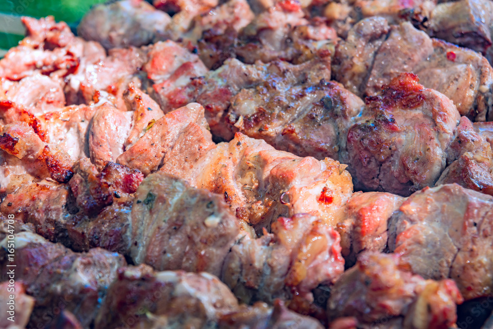 Sven shashlik closeup mashed slices of meat put on metal skewers roasted on charcoal grill with charcoal on otlichie Sven shashlik closeup mashed slices of meat put on metal skewers roasted on charcoal grill with charcoal on otlichie