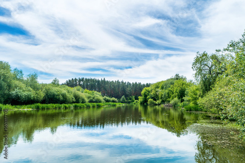 Calm landscape with blue river