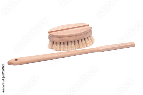 Natural bristle body brush with detachable long handle isolated on white background photo