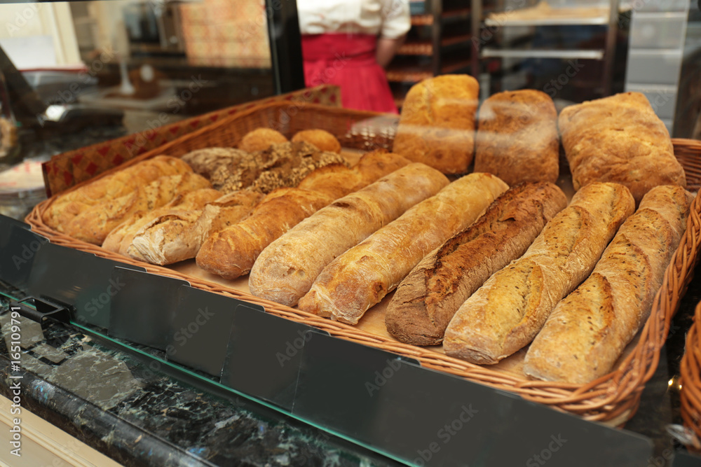 Counter with bakery products in shop, closeup