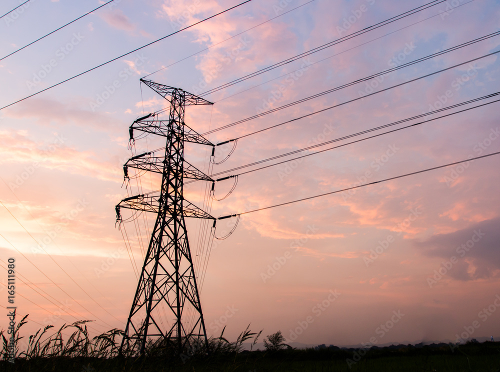 Fototapeta premium silhouette of high voltage electrical pole structure