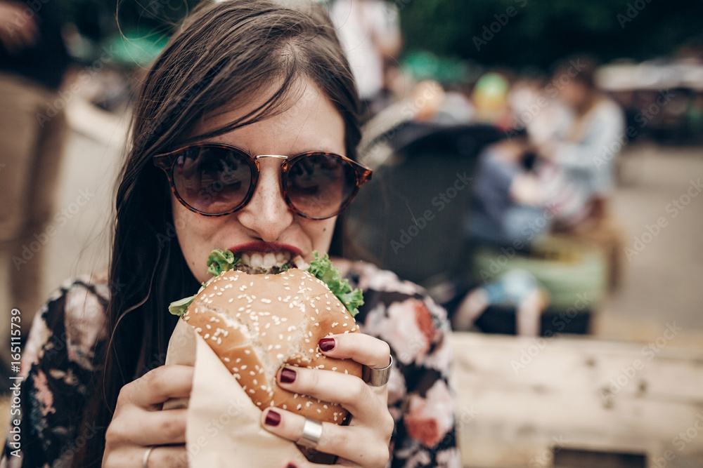 Stylish Hipster Woman Eating Juicy Burger Boho Girl Biting Yummy Cheeseburger Smiling At