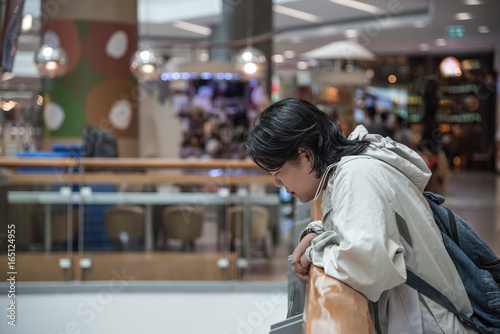 Asian women 40s white skin in shopping mall