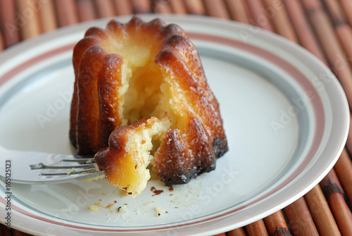Cannele on Fork with Bamboo Placemat