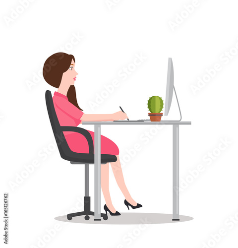 girl working on computer table looking at screen while drawing designing or writing