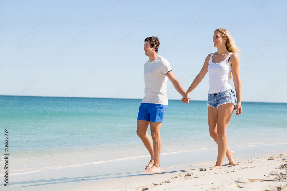 Romantic young couple on the beach