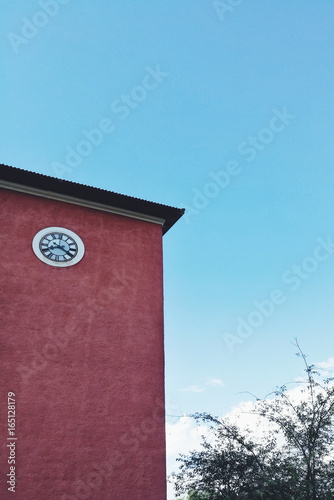 Clock tower building on blue clear sky 
