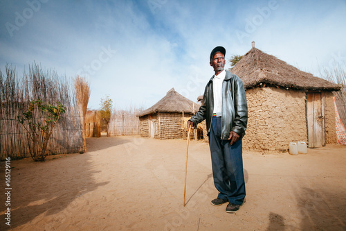 African Hambukushu man standing in his kraal photo