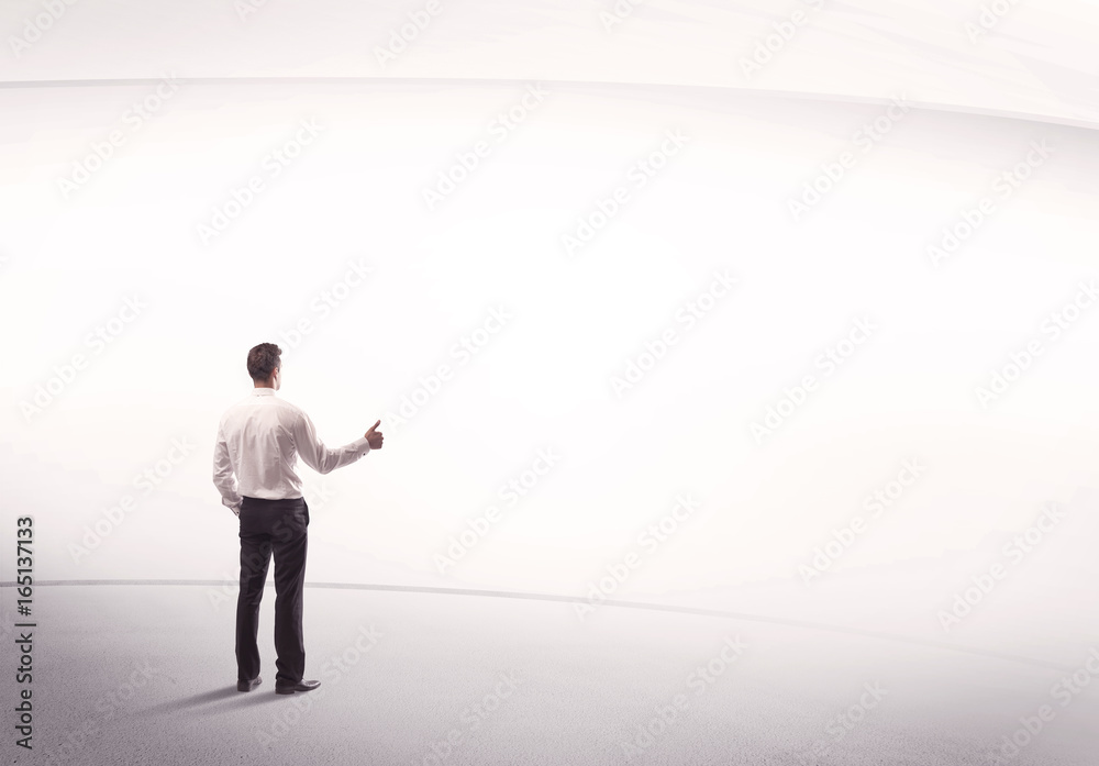 Businessman with briefcase standing still Businessman with briefcase standing still