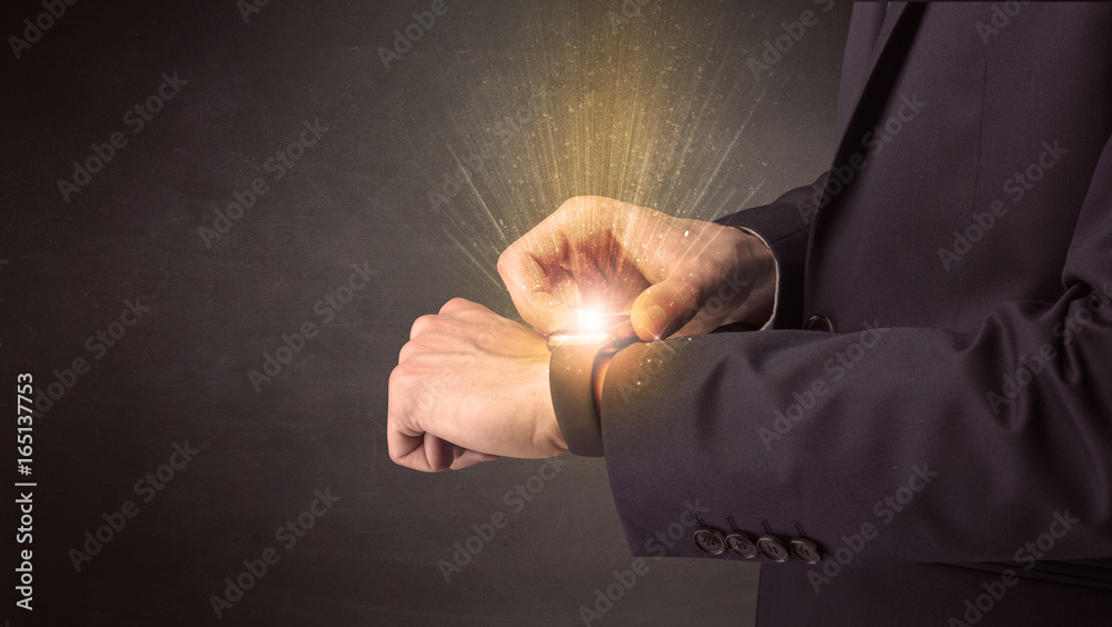 Fototapeta premium Businessman wearing smartwatch.