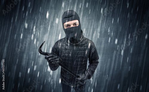 Caught burglar by house camera in action.