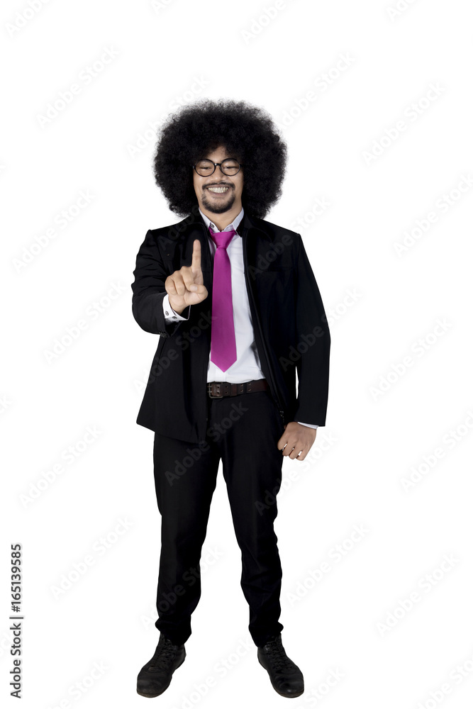 Businessman pressing on a touch screen Businessman pressing on a touch screen