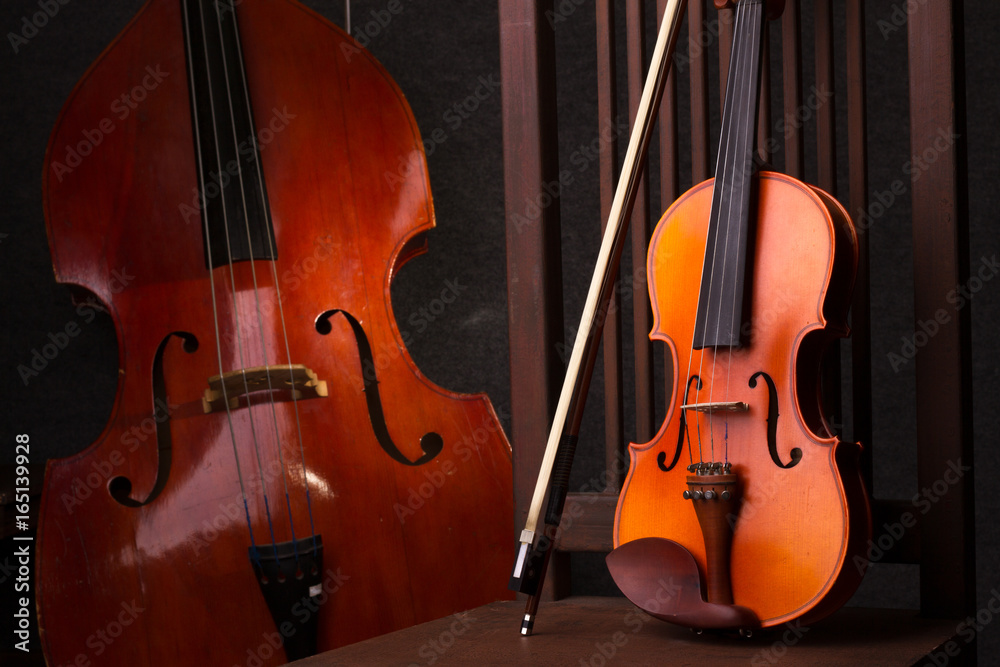 Fototapeta violin in vintage style on wood background