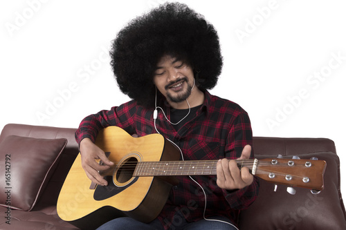 Male guitarist playing guitar