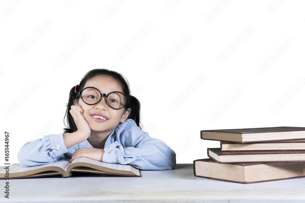 Pensive girl student with books on studio Pensive girl student with books on studio