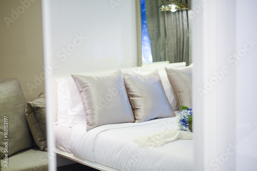 uxury bedroom with pillows