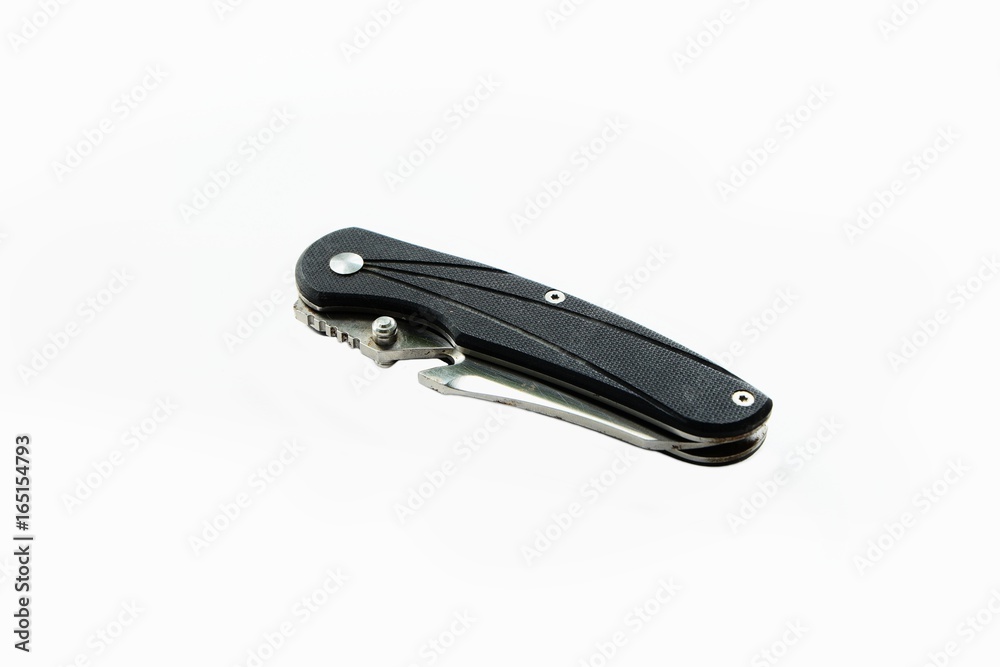 Folding knife on white background Folding knife on white background