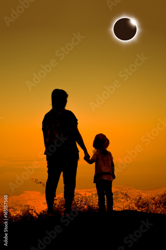 Amazing scientific natural phenomenon. Total solar eclipse glowing on sky.