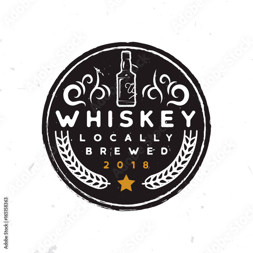 Round whiskey label with a whiskey bottle, ornament, wheat and star