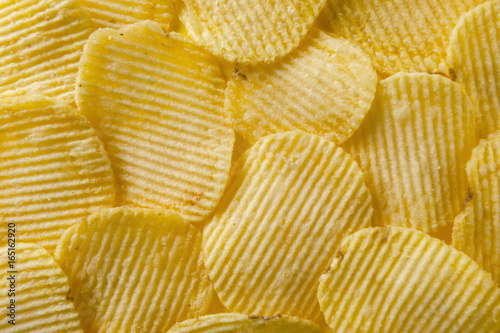 Closeup of wavy potato chips.