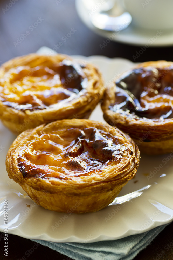 Pasteis de Nata or Belém, Portuguese Custard Tarts, In a Cafe Pasteis de Nata or Belém, Portuguese Custard Tarts, In a Cafe
