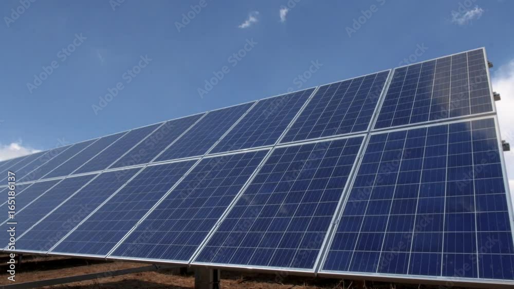 Solar panels with beautiful cloud reflection time lapse