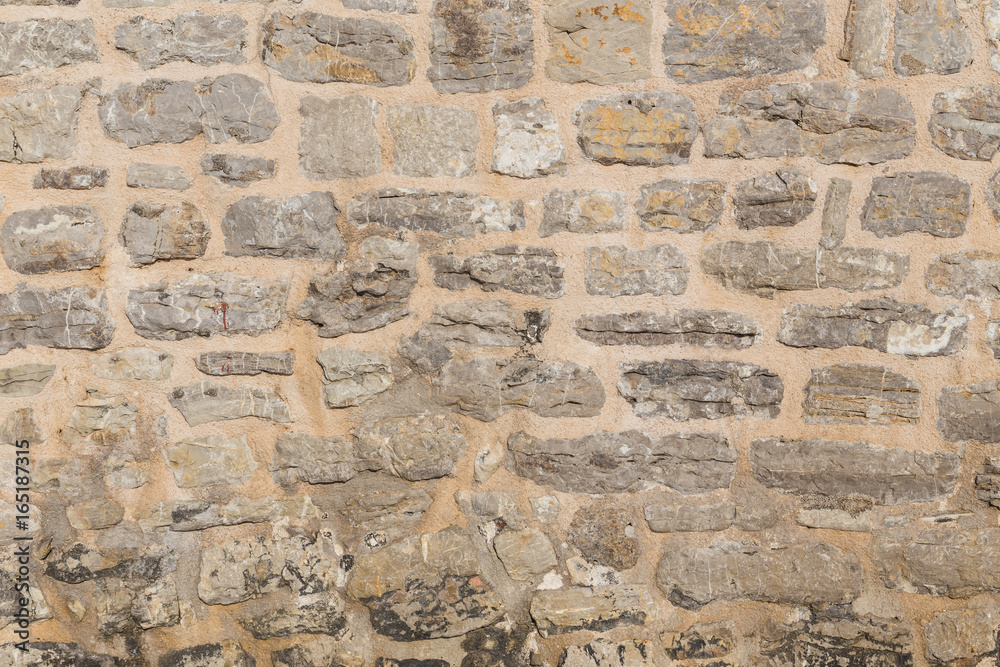 Pattern of the ancient style stone wall with cement. Pattern of the ancient style stone wall with cement.