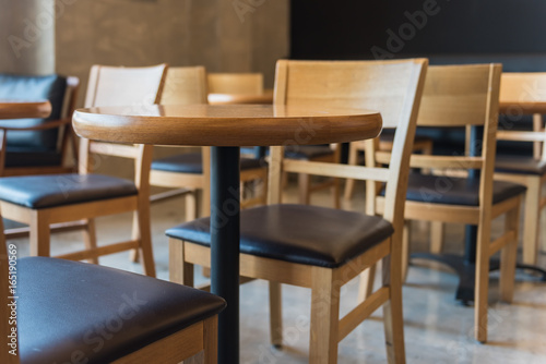 set of wooden round table and chair