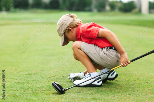 series of a boy golfing with his father