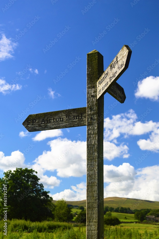 Wooden signpost in the Yorkshire countryside. Wooden signpost in the Yorkshire countryside.