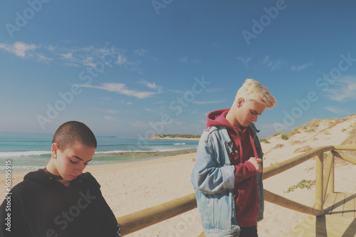 Girl and boy with beach background