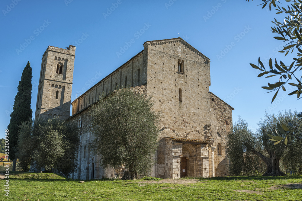 The Romanesque Abbey of Sant Antimo is a former Benedictine monastery in the comune of Montalcino, Tuscany.