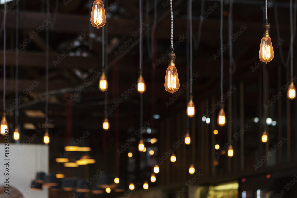 Light bulbs hanging with dark background