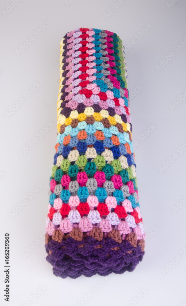 blanket or crochet blanket on a background. blanket or crochet blanket on a background.