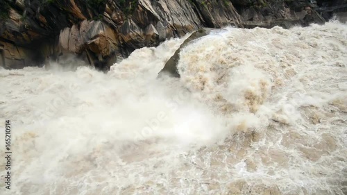 Tiger leaping gorge is a gorge formed by river Jinsha, the upper reach of the Yangtse river. It is a part of famous World Heritage Site Three Parallel rivers.